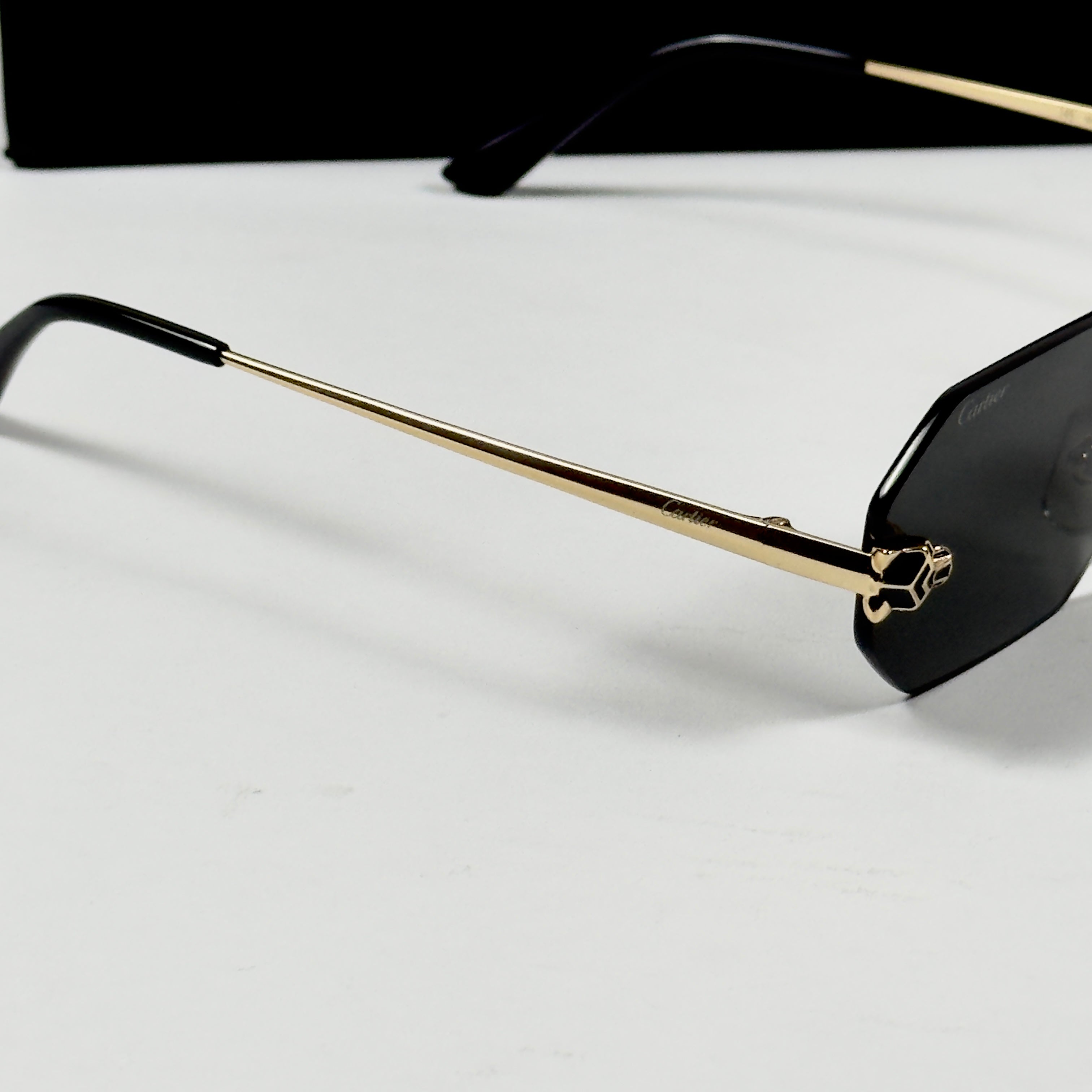 Cartier – 0599 - 56 – Golden Black - Metal - Sunglasses – Unisex - Premium